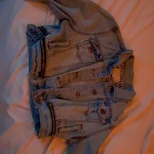 This is just a jeans jacket with zippers as pockets